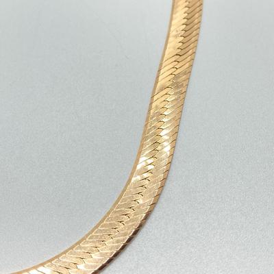 LOT 62: Italy Gold Herringbone Chain Necklace - 14KT / 585, TW 21.33g, 14"