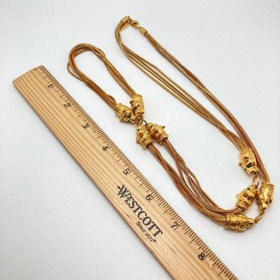 LOT 75: Beautiful Camrose Kross JBK (Jackie Kennedy) Gold Tone Green Eyed Panther Necklace and Joan Rivers Multi-Strand Beaded Necklace