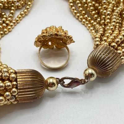 LOT 79: Vintage Gold Tone / Black Fashion Jewelry and Accessory Collection - Coin Stretch Belt, Necklaces, Earrings and Ring
