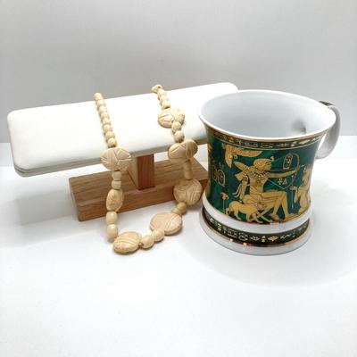 LOT 80: Egyptian Collection - Carved Bone Necklace, Fathi Mahmoud Mug and Stamps