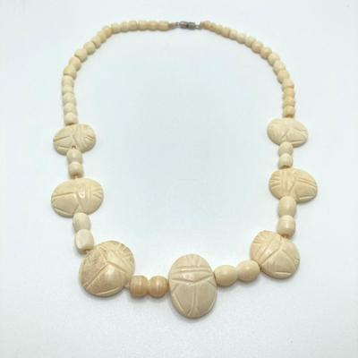 LOT 80: Egyptian Collection - Carved Bone Necklace, Fathi Mahmoud Mug and Stamps