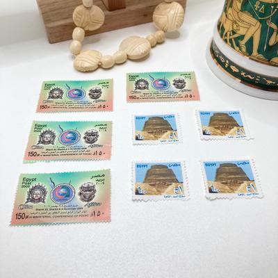 LOT 80: Egyptian Collection - Carved Bone Necklace, Fathi Mahmoud Mug and Stamps