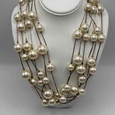 LOT 85: Opera Length Faux Pearl Necklace (40"), Faux Gray Pearl Necklaces & a Multi Strand Gold Tone/Pearl Necklace