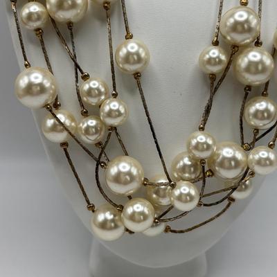 LOT 85: Opera Length Faux Pearl Necklace (40"), Faux Gray Pearl Necklaces & a Multi Strand Gold Tone/Pearl Necklace