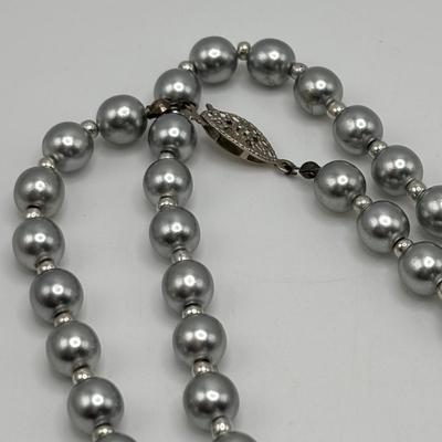 LOT 85: Opera Length Faux Pearl Necklace (40"), Faux Gray Pearl Necklaces & a Multi Strand Gold Tone/Pearl Necklace