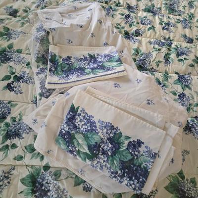LOT 136: Blue/Periwinkle Flowered Comforter, Matching Pillow Shams, and Full Size Sheet Set