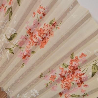 LOT 138: Vintage Cloth and Wood Hand-Painted Fan, Antique Mouring Hand Fan, Vintage Bamboo Hand Fan, and Lladro Kiyoko Porcelain Figurine