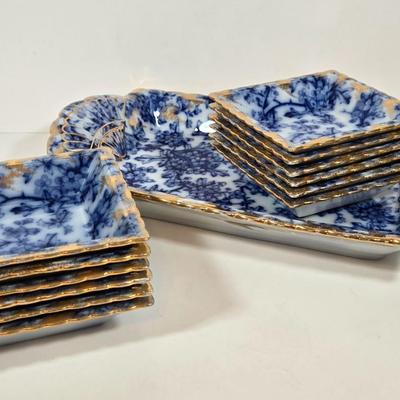 LOT 142: Mercer China Serving Plate and 12 Matching Desert Bowls with Gold-tone Accents