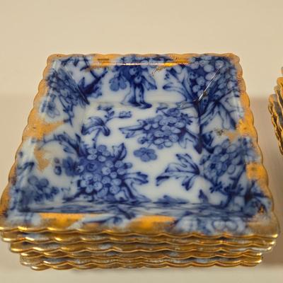 LOT 142: Mercer China Serving Plate and 12 Matching Desert Bowls with Gold-tone Accents
