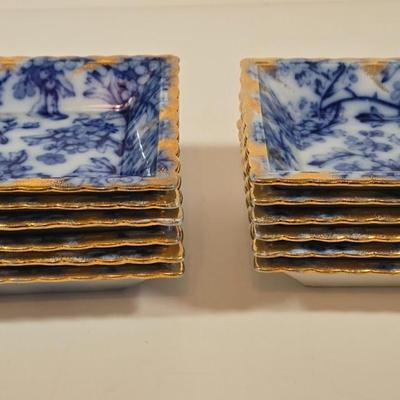 LOT 142: Mercer China Serving Plate and 12 Matching Desert Bowls with Gold-tone Accents