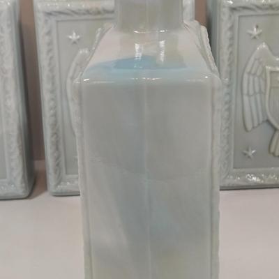 LOT 143: Vintage J.W. Dant Americana Collection Milk Glass Whiskey Decanters from the 1960s.