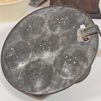 LOT 149: Primitive Tin Antique Poached Egg Maker, Antique Wood and Cast Iron Manuel Coffee Grinder, Chamberstick Candle Holder, and More