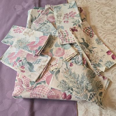 LOT 150: Linens Including Rectangle Tablecloths, Small Round Table Clothes, Table Scarves, Napkins, and More