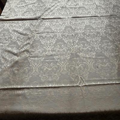 LOT 150: Linens Including Rectangle Tablecloths, Small Round Table Clothes, Table Scarves, Napkins, and More