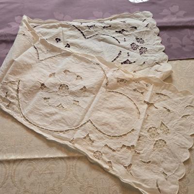 LOT 150: Linens Including Rectangle Tablecloths, Small Round Table Clothes, Table Scarves, Napkins, and More