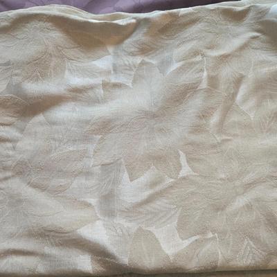 LOT 150: Linens Including Rectangle Tablecloths, Small Round Table Clothes, Table Scarves, Napkins, and More