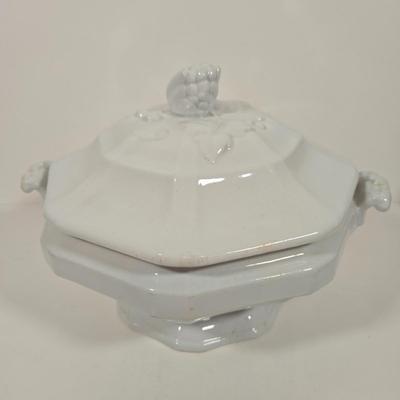 LOT 157: Faux Vegetables in Metal Basket, Ironstone Tureen, and Loucarte Portugal Ceramic Basket Weave Design Serving Platter