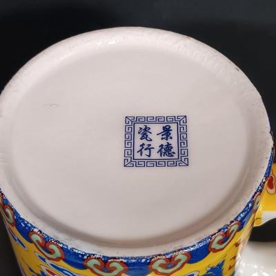 LOT 169: Folded Paper Fish Mobile, Dragon Tea Cup with Infuser & More