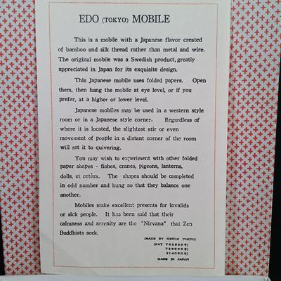 LOT 169: Folded Paper Fish Mobile, Dragon Tea Cup with Infuser & More