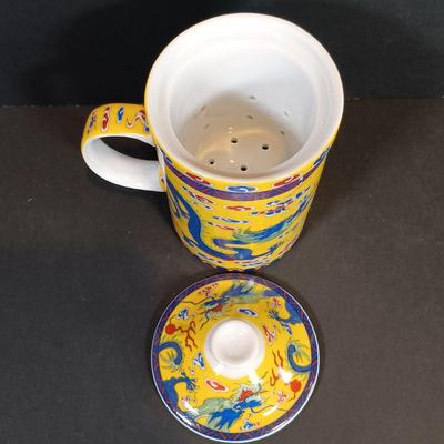 LOT 169: Folded Paper Fish Mobile, Dragon Tea Cup with Infuser & More