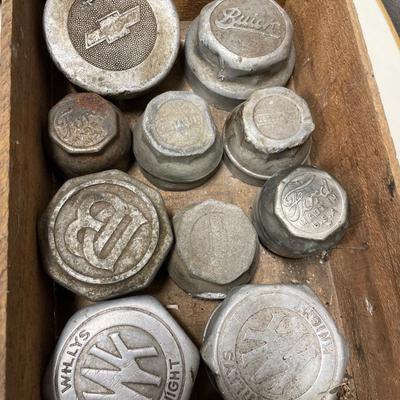 Vintage hub caps in wood box