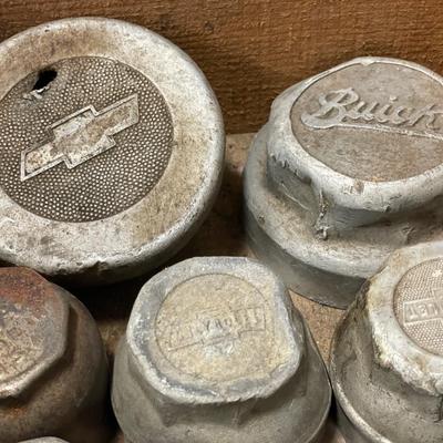 Vintage hub caps in wood box