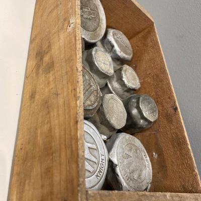 Vintage hub caps in wood box