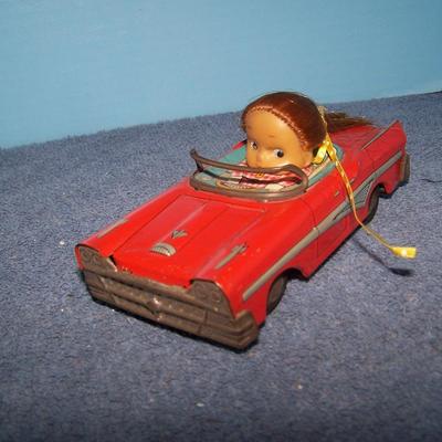 LOT 174 GRAND VINTAGE TIN LITHO FRICTION GIRL in CAR