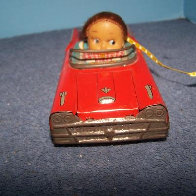 LOT 174 GRAND VINTAGE TIN LITHO FRICTION GIRL in CAR