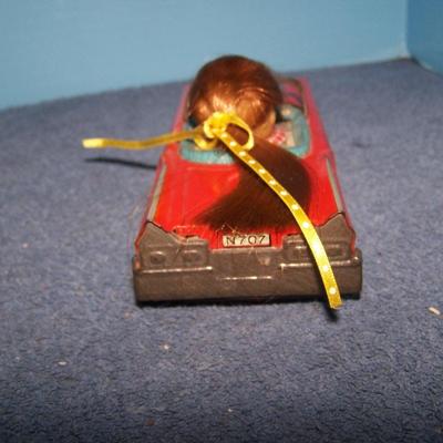 LOT 174 GRAND VINTAGE TIN LITHO FRICTION GIRL in CAR