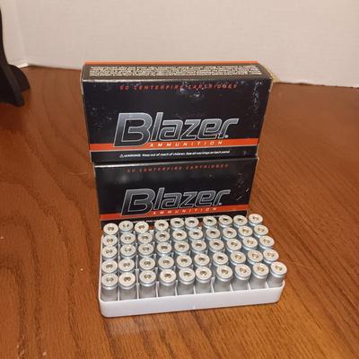 2 FULL BOXES OF BLAZER 45 AUTO AMMUNITION