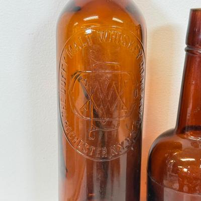 LOT 28: Vintage Brown Glass Flasks & Bottles