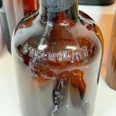 LOT 28: Vintage Brown Glass Flasks & Bottles