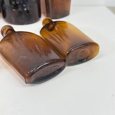 LOT 28: Vintage Brown Glass Flasks & Bottles