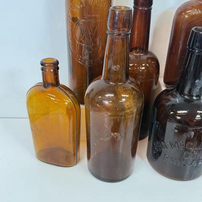LOT 28: Vintage Brown Glass Flasks & Bottles
