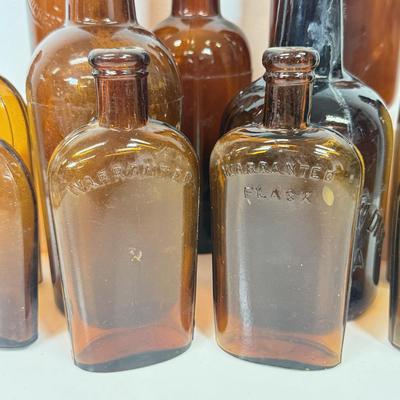 LOT 28: Vintage Brown Glass Flasks & Bottles