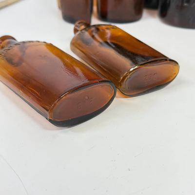 LOT 28: Vintage Brown Glass Flasks & Bottles