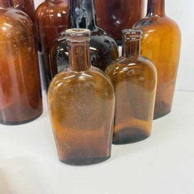 LOT 28: Vintage Brown Glass Flasks & Bottles