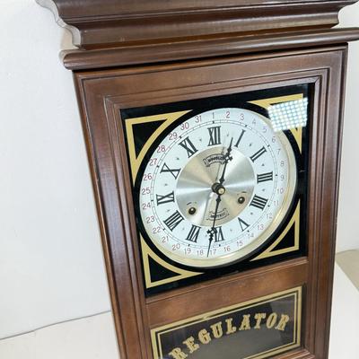 LOT 126: Mogull Monthly Regulator Wall Clock