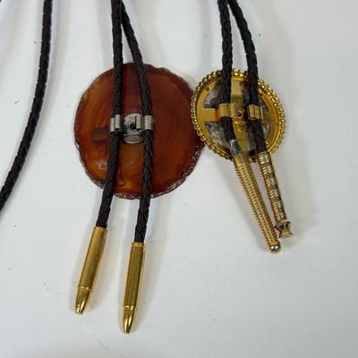 LOT 134: Bolo Ties: Stone, Eagle, Arrowhead & More