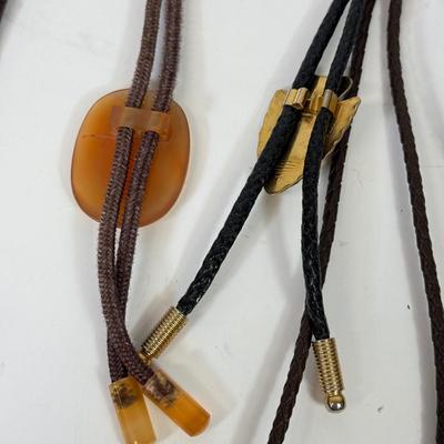 LOT 134: Bolo Ties: Stone, Eagle, Arrowhead & More