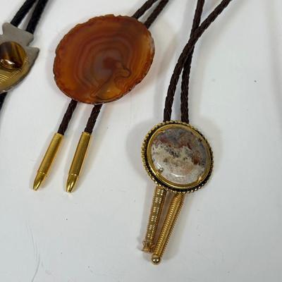 LOT 134: Bolo Ties: Stone, Eagle, Arrowhead & More