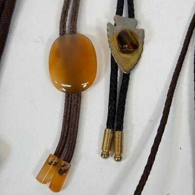 LOT 134: Bolo Ties: Stone, Eagle, Arrowhead & More