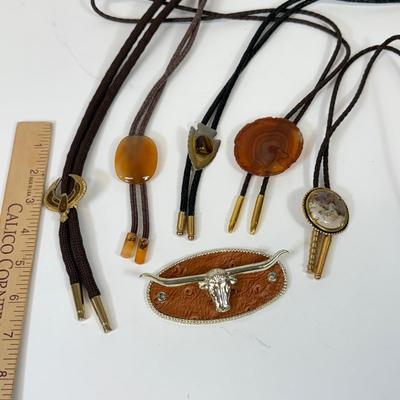 LOT 134: Bolo Ties: Stone, Eagle, Arrowhead & More