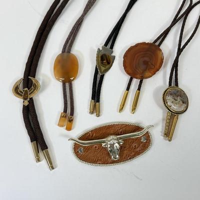 LOT 134: Bolo Ties: Stone, Eagle, Arrowhead & More