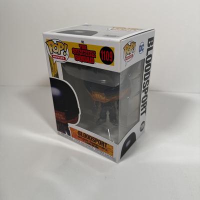 LOT 172: Two DC Funko Pops: The Joker (414) & Bloodsport (1109)