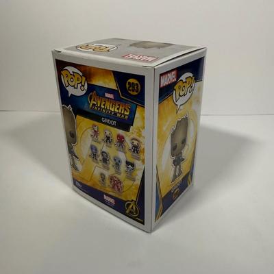 LOT 177: Four Marvel Funko Pops: Thor (286), Groot (293), Vision (307), & Gingerbread Iron Man MINI (140)