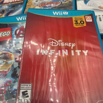 LOT 194: Wii-U Game Collection - Super Mario Bros, Lego Avengers, Super Smash Bros and More