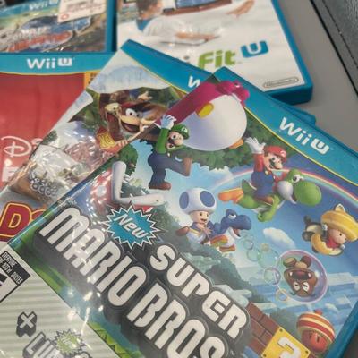 LOT 194: Wii-U Game Collection - Super Mario Bros, Lego Avengers, Super Smash Bros and More