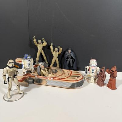 LOT 207: Star Wars Landspeeder Toy and Figures - A New Hope - 1990s